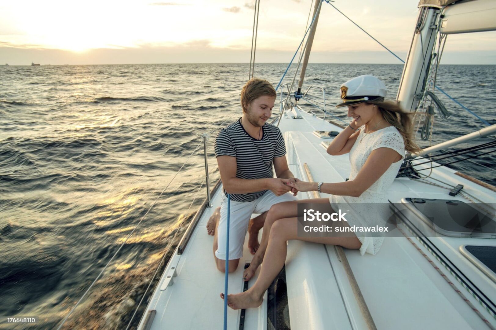 Romantic proposal scene on yacht