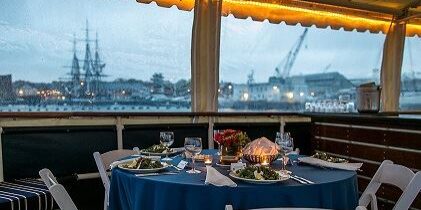 A table with plates and silverware on it.